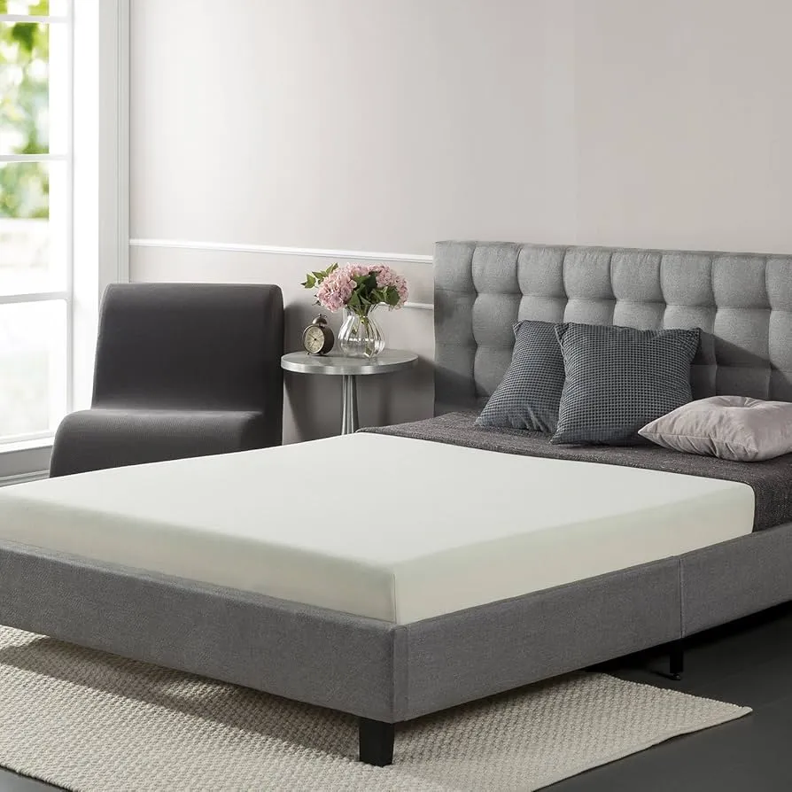 Waterproof mattress protector covering a mattress
